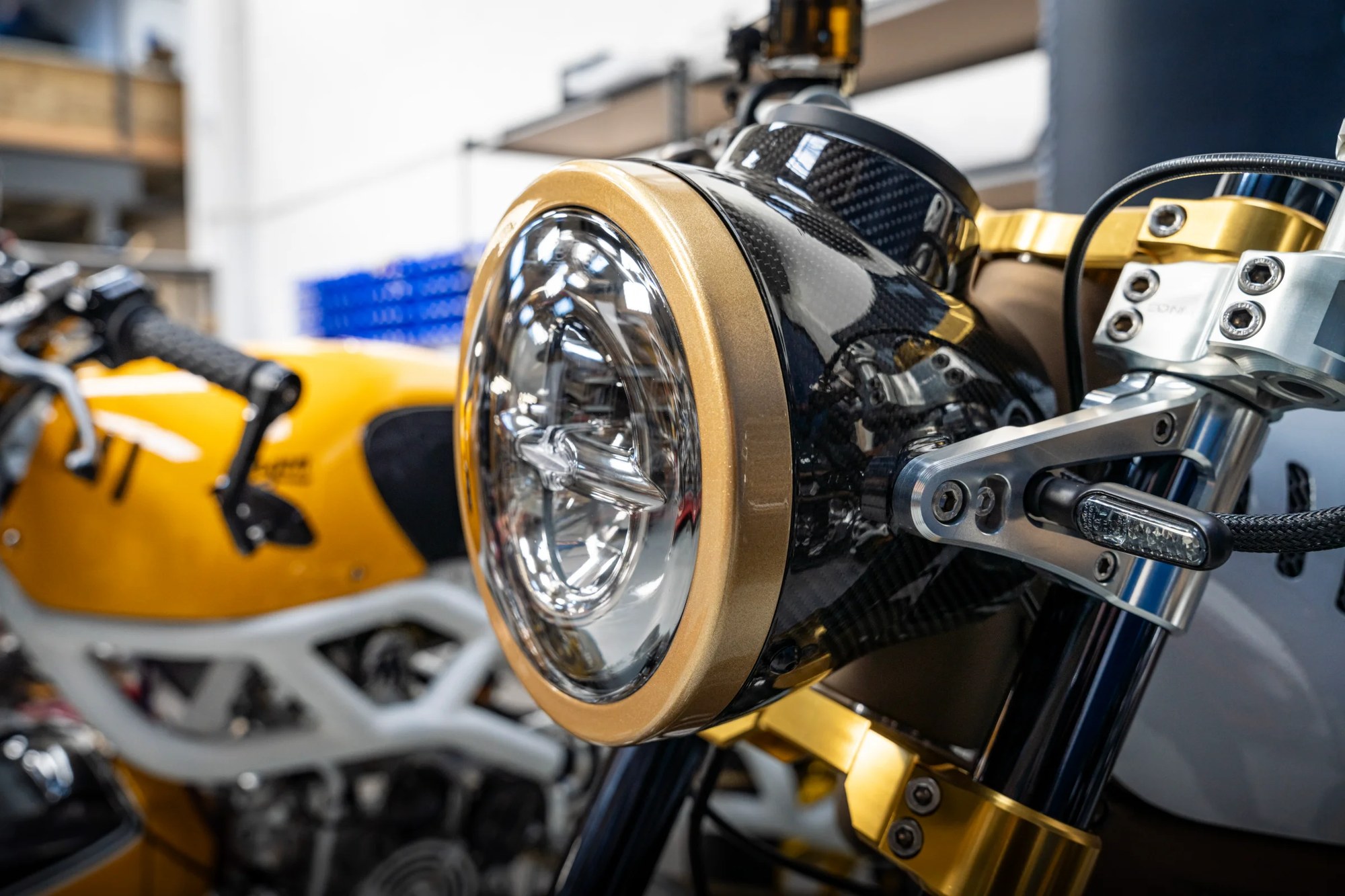 Two Stroke headlamp with gold bezel